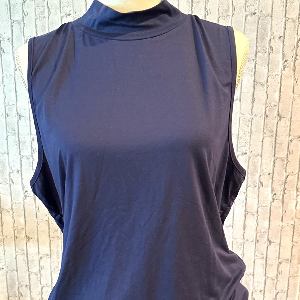 Mock sleeveless turtleneck